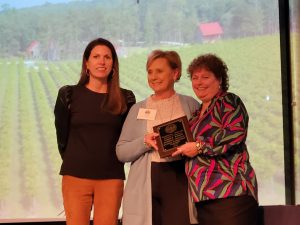 Sondra Guyton of BCC was presented the award by former Chamber President Jennifer Leggett and Executive Director Terri Dennison